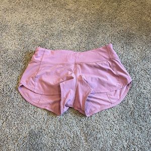 Lululemon pink 2.5 low rise speed up shorts. Size 4 regular.